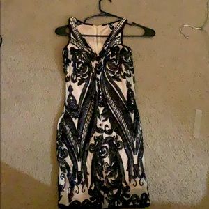 Nude dress with black sequins